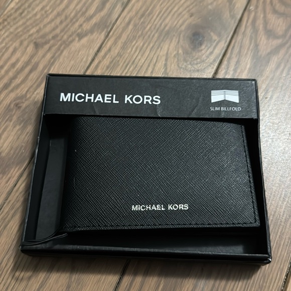 NWT Michael Kors Size NS Andy slim Bifold wallet in black. In box. 4” x 3.5”. - Picture 1 of 9